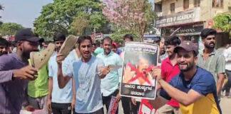 ಧಾರವಾಡದಲ್ಲಿ ಉಗ್ರಗೊಂಡ ಉದ್ಯೋಗಾಕಾಂಕ್ಷಿಗಳ ಹೋರಾಟ: ಸಚಿವರ ಭಾವಚಿತ್ರಗಳಿಗೆ ಚಪ್ಪಲಿ ಸೇವೆ