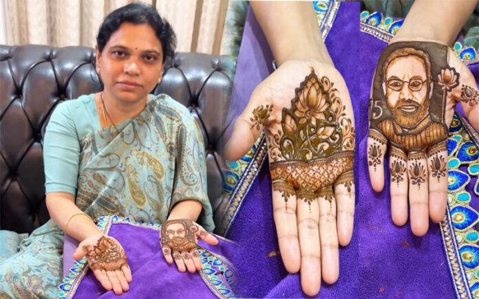 lakshmi-aruna-celebrates-modi-record-with-mehendi-portrait-on-her-birthday